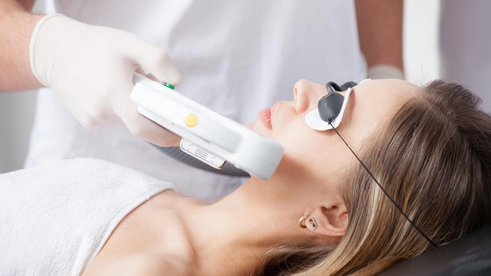 What are the benefits offered by laser facial hair removal services?