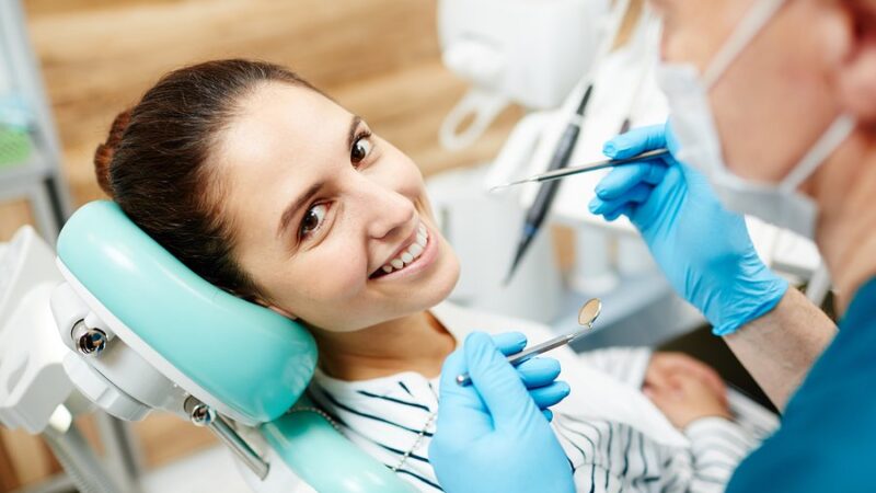 What gives you the reason to visit a dentist?