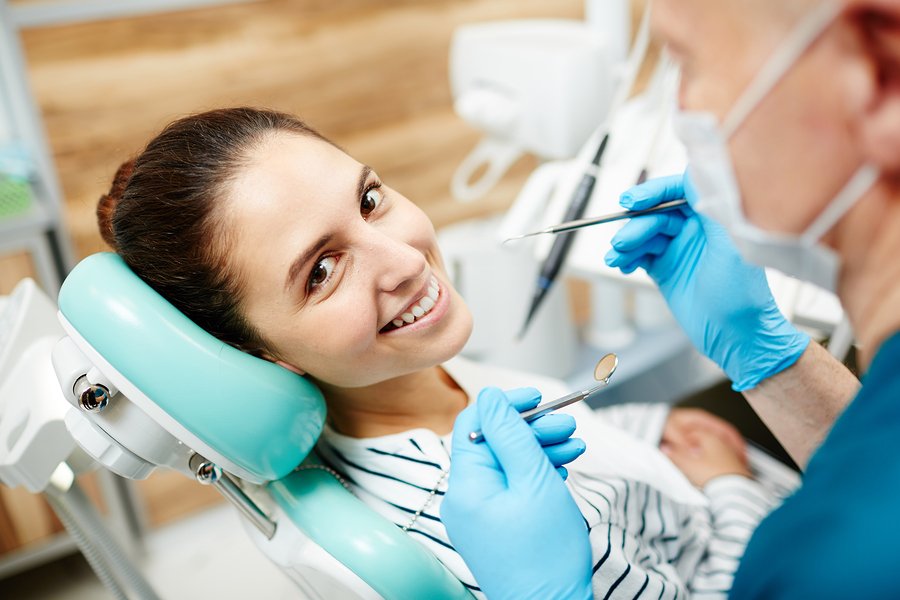 What gives you the reason to visit a dentist?